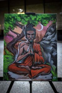 Thomas Lucero painted this painting of Budda for the Visions of Words event. 